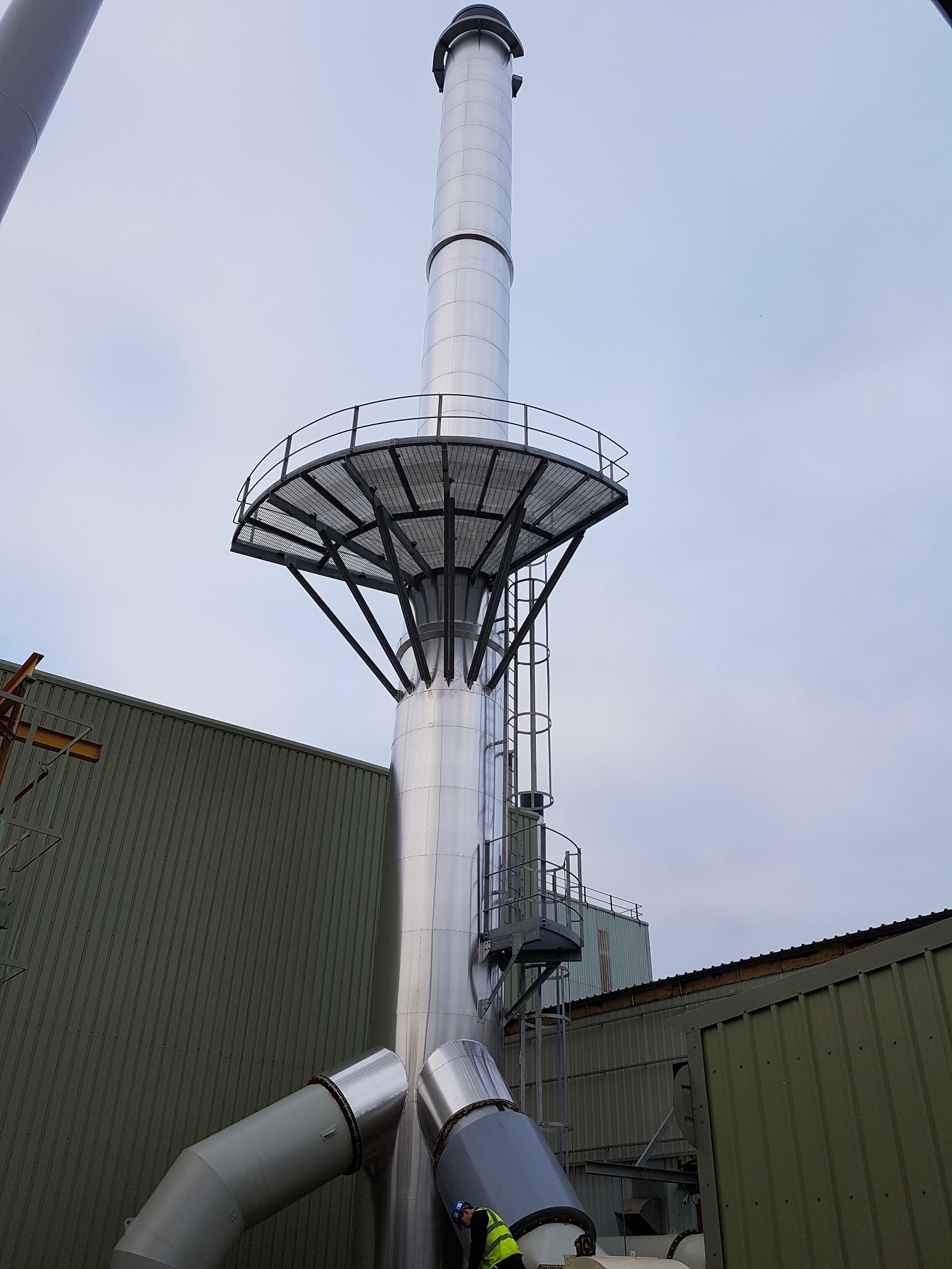 insulated and clad single flue chimney with M1 compliant monitoring platflorm and damper